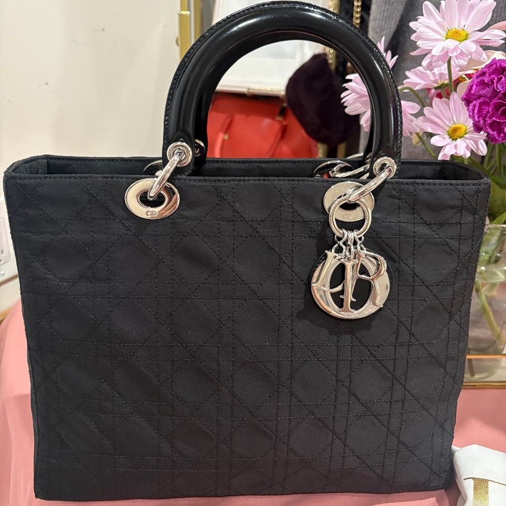 Authentic, preloved Christian Dior, Lady D. Cannage Black  hand bag with sling.